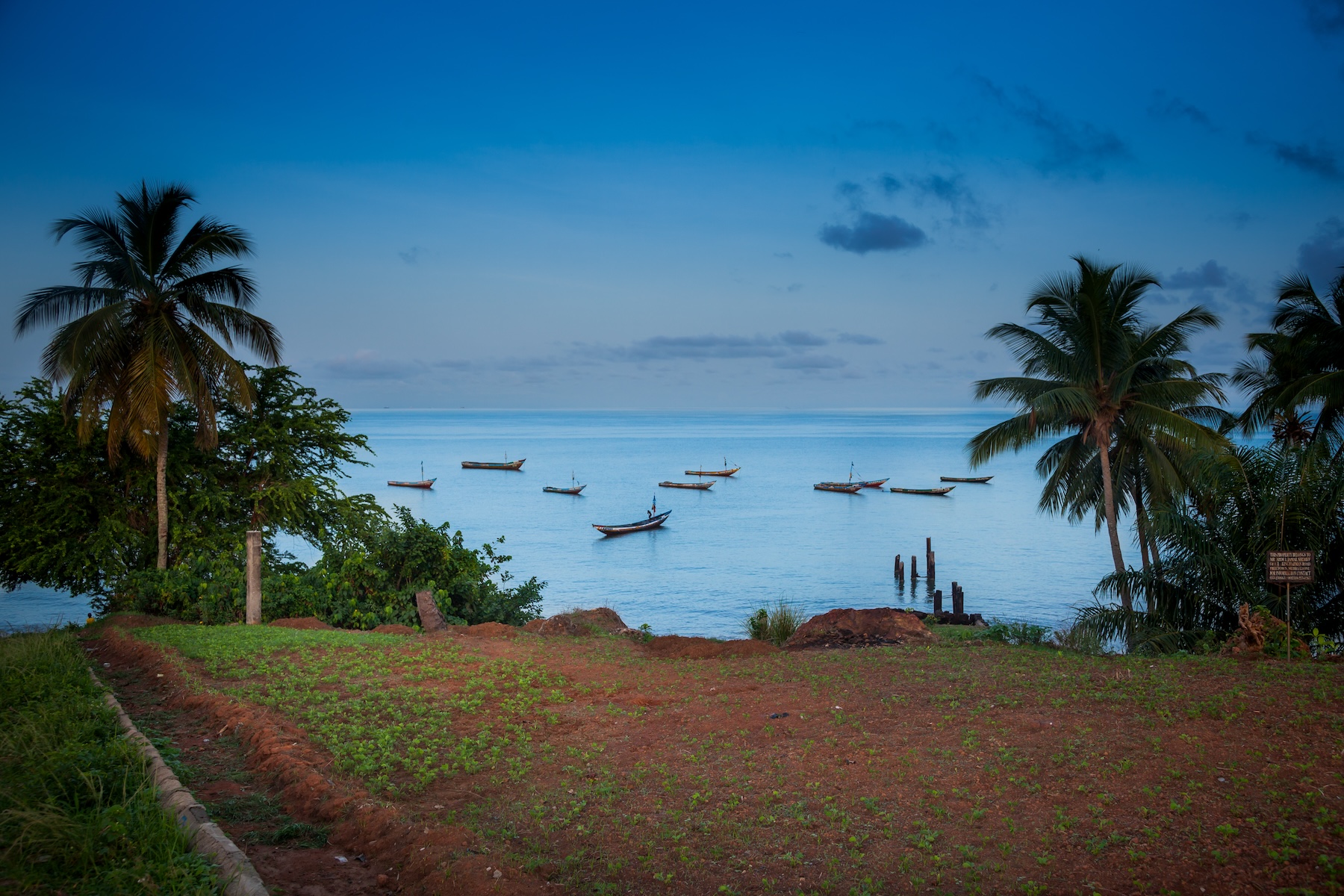 Fishing boats in front of beach in Freetown, Sierra Leone.